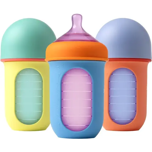 Boon Nursh Bottles - Silicone Baby Bottles Help Ease Colic Symptoms - Reusable Food-Grade Silicone Pouches with Polypropylene Shell - Medium Flow - 8 Oz - Color Block