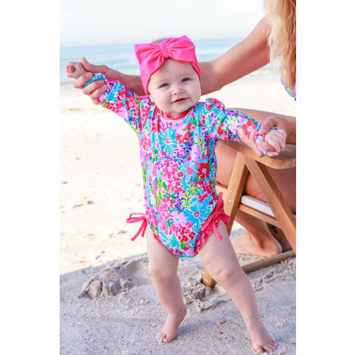 UPV 50 Long Sleeve Rash Guard With Ruffle Bottom | Petal Splash