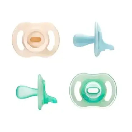 Tommee Tippee Stay Put Pacifier Set, Contains 2 Ultra-Light StayPut Glow in the Dark Pacifiers and 2 Ultra-Light StayPut Pacifiers, 0-6 Months, Colors May Vary, One-Piece Silicone Design, Pack of 4