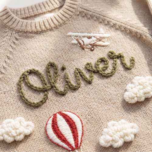 Personalized Hand-Embroidered Baby Sweater with Airplane and Hot Air Balloon Designs