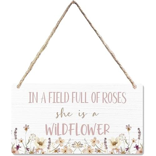 CGBHW In a Field of Roses She is a Wildflower Wooden Sign, Pink Floral Baby Girl Nursery Girls Room Hanging Sign Wall Decor, Girls Bedroom Toddler Baby Kids Little Girl Room Door Decor 12 x 6 Inch