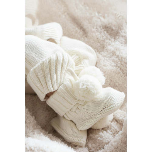 Knit Pom Pom Baby Booties in Ivory | Caden Lane