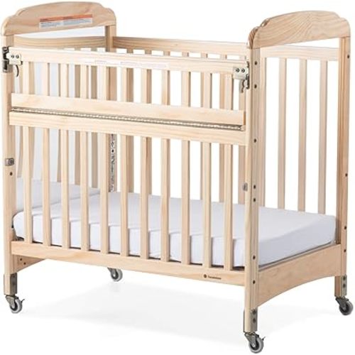 Foundations Serenity SafeReach Side Compact Crib, Nonmarking Commercial Casters, Low Profile, Solid Steel Frame, Adjustable Mattress Board, Mirrorview End Panel (Natural Wood)