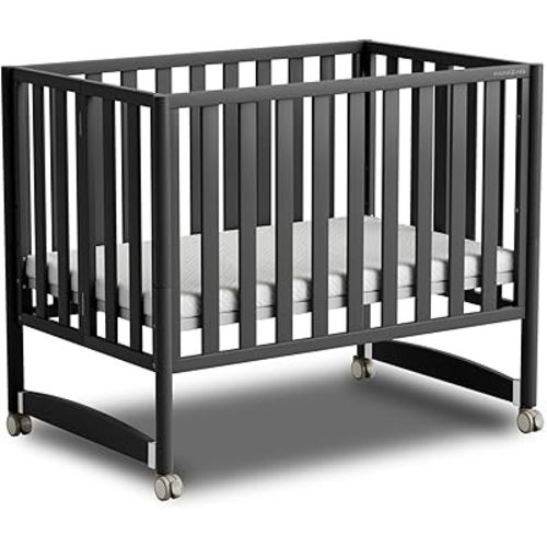 EvoNook 7-in-1 Convertible Mini Crib - Easy Assembly, Portable Folding Baby Mini Crib with Wheels, 100% New Zealand Pinewood, 4 Adjustable Mattress Heights (Crib, Midnight Oak)