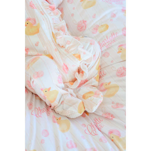 Ruffle Zipper Footie in Bubble Duckies Pink | Caden Lane