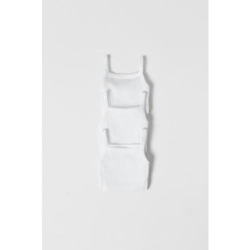 THREE-PACK OF SURPLICE WRAP BODYSUITSTHREE-PACK OF SLEEVELESS BODYSUITSFIVE PACK OF PUPPY BODYSUITS