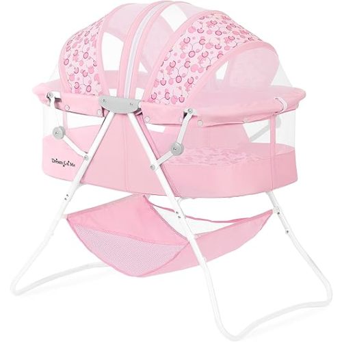 Dream On Me Karley Bassinet in Pink, Lightweight Portable Baby Bassinet, Quick Fold and Easy to Carry, Adjustable Double Canopy, Indoor and Outdoor Bassinet with Large Storage Basket.