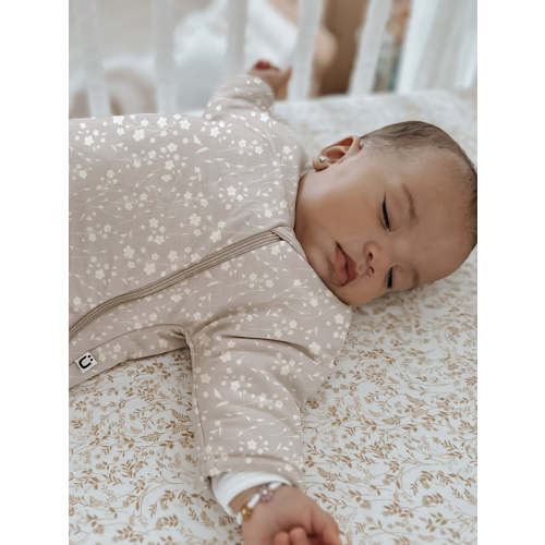 Keep baby cozy with our 1.0 TOG bamboo viscose sleep sack in Magnolia. One-of-a-kind WONDERZiP makes diaper changes easy while baby stays covered.