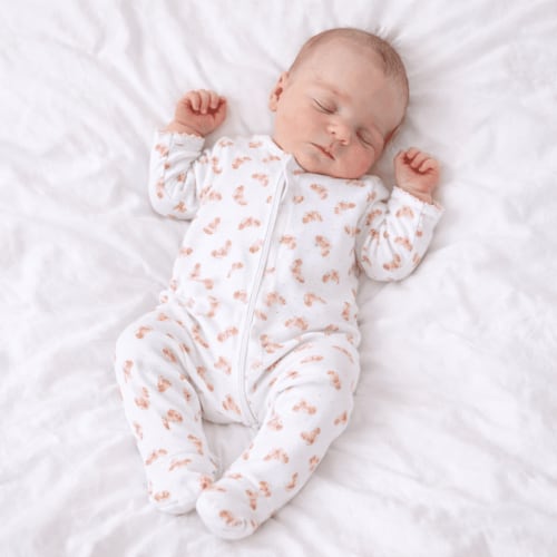 Petit Croissant Print Zip Footie in Newborn