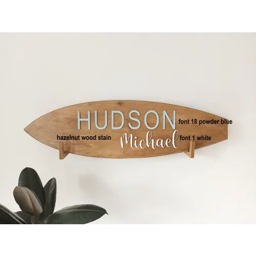 Surfboard Name Decor (With Wall Mount 35x10) - Natural Board color, 

Lucille (white, font 3) Raye (papaya, font 3)