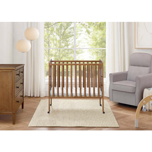Lee Portable Folding Mini Crib with 1.5-Inch Mattress | Delta Children