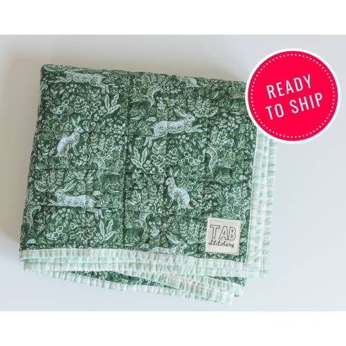 Modern heirloom baby quilt, baby shower gift for boy, Rifle Paper Co wholecloth quilt, woodland rabbits and green gingham crib blanket