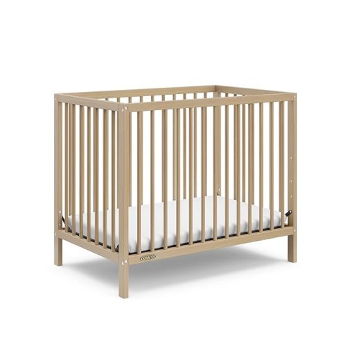 Graco Teddi 4-in-1 Convertible Mini Crib with Bonus Water-Resistant Mattress – GREENGUARD Gold Certified, 2.75-Inch Mattress Included, Small Spaces Crib, Easy 30-Minute Assembly (Driftwood)