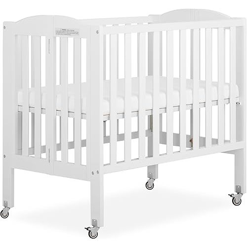 Dream On Me 2-in-1 Folding Portable Compact Mini Baby Crib in White, GreenGuard Gold & BSA, US Patented Flat Folding System, Locking Wheels,1″ Mattress Pad, Space-Saving Quck Fold Easy Storage