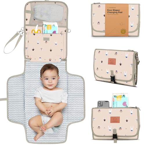 KeaBabies Portable Diaper Changing Pad - Large Waterproof Baby Changing Mat, Compact Travel Diaper Clutch, Functional Pockets Fit Newborn Essentials, Wipeable & Padded Baby Changer (Wild Patrol)