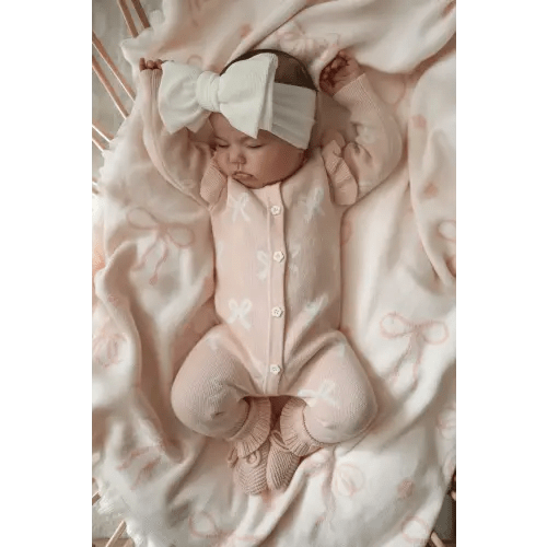 LONG FLUTTER BOW ROMPER | BABY PINK