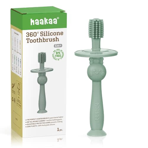 haakaa 360° Baby Toothbrush with Suction Base - Gentle Cleaning for Infant Self-Brushing Training, Food-Grade Silicone, Adjustable Safety Shield - Pea Green (1 Piece)
