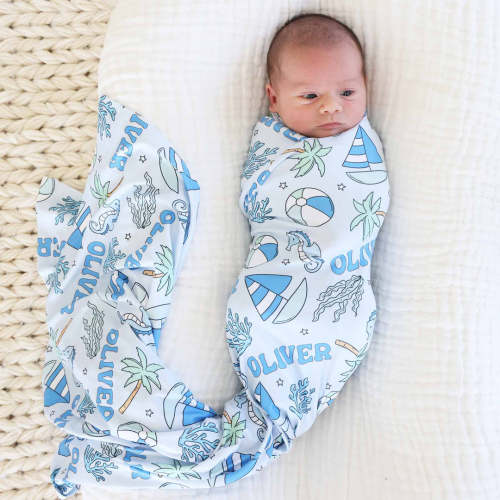 Tiny Tides Personalized Swaddle Blanket in Blue | Caden Lane