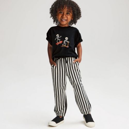 Toddler Boys' 2pc Halloween Skating Skeleton Short Sleeve French Terry Top & Bottom Set- Cat & Jack™ Black 12M