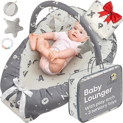Portable Baby Lounger for Newborn w/Removable Arch & 3 Toys - Infant Lounger w/ 38% More Protection - Comfort, Breathable and Soft Floor Dock a Tot for Home and Travel | 0-24 (Grey ABC)