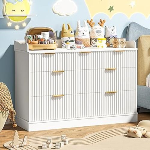 Vabches Nursery Dresser, 7 Drawer Wood Baby Changing Dresser with Raised Changing Table Top, Fluted Chest with Gold Handles, Safe & Spacious Storage Organizer for Kids Bedroom Nursery Room, White
