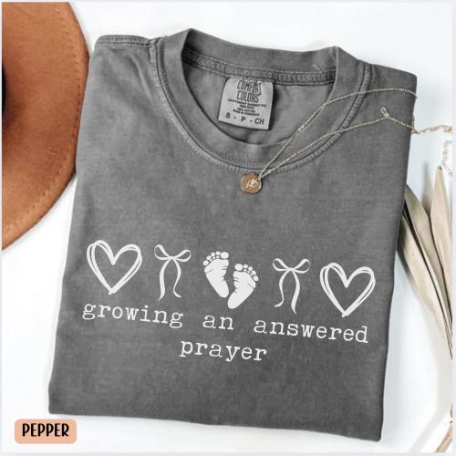 Comfort Colors® Growing An Answered Prayer Christian Mom Shirt, Coquette Pregnancy Reveal, Announcement Mom To Be Tee, Baby Shower Gift