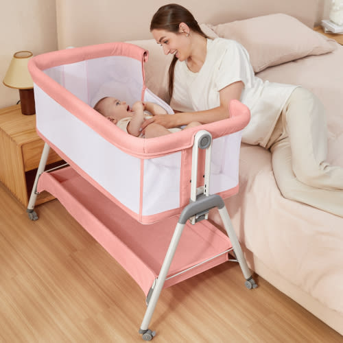 ANGELBLISS Bedside Sleeper with Storage Basket, Easy Folding Portable Bassinet with Wheels, Adjustable Height, Included Breathable Mesh, Cozy Mattress(Pink)