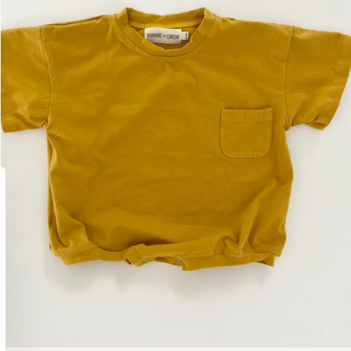 Cory Pocket Romper in Mustard | Baby and Toddler | WinnieandCrew.com – Winnie + Crew