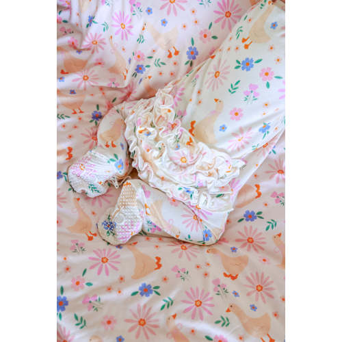 Ruffle Zipper Footie in Loosey Goose | Caden Lane