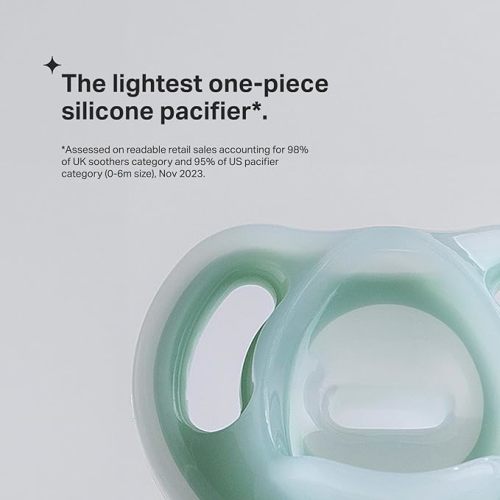Tommee Tippee Ultra-Light Silicone Pacifier, 6-18 Months, Symmetrical One-Piece Design, BPA-Free Silicone Binkies, Clear/Blue/Yellow, Pack of 4