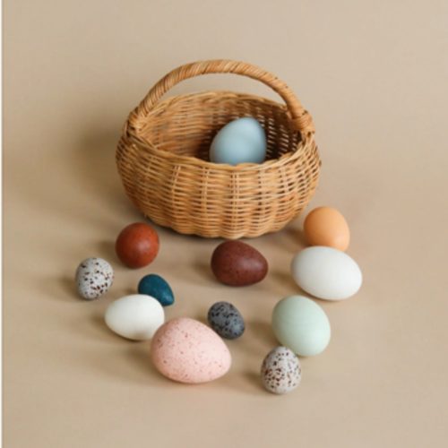 A Dozen Wooden Bird Eggs In A Basket– Odin Parker