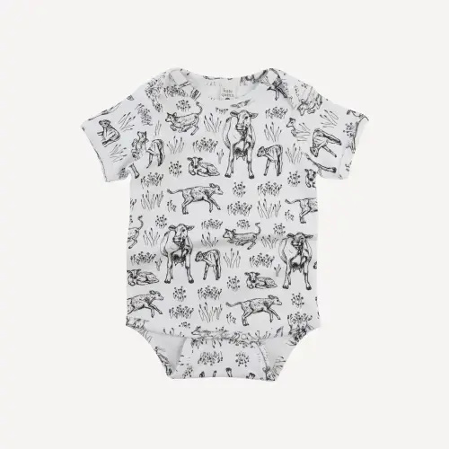 short sleeve lap neck bodysuit | black cow pasture | organic cotton interlock