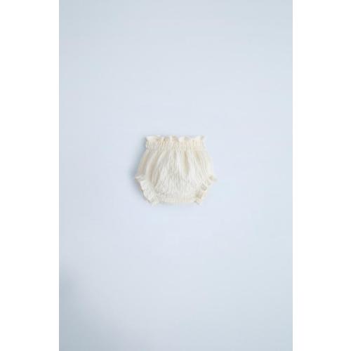 TEXTURED BONNETSTRUCTURED UNDERPANTSSEED STITCH KNIT JACKET