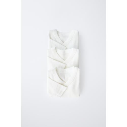THREE-PACK OF LONG SLEEVE WRAP NECK BODYSUITS - Oyster-white