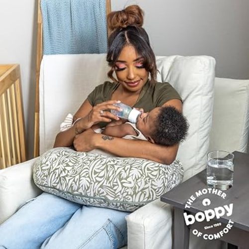 Boppy Nursing Pillow - Ergonomic Bottle & Breastfeeding Pillow, Higher, Firmer & Larger, Water-Repellent with Washable Organic Cotton Cover, Baby Safety Alliance Verified - Green Cut Out Leaves