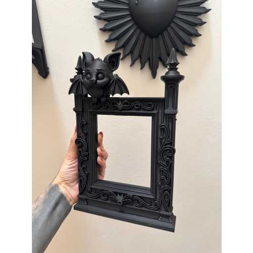 Creepy Cute Baby Bat Frame with Gothic Architecture Details for Spooky Home Decor or Halloween Photo Display