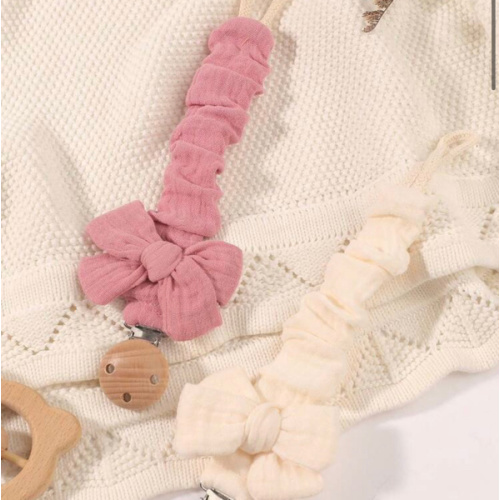 2pcs Baby Solid & Printed Pacifier Clips, Bowknot Pacifier Holder, Wooden 3-Hole Pacifier Clips, Suitable For Daily Use In Blue, Pink, Khaki | SHEIN USA