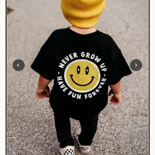 Never Grow Up T-Shirt