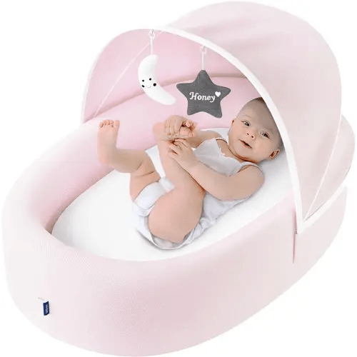 Premium Portable Baby Lounger Nest – Foldable Travel Bassinet for Newborn & Infant with Mesh Canopy, 2 Toys, Waterproof Mattress & Removable Cover – Pink