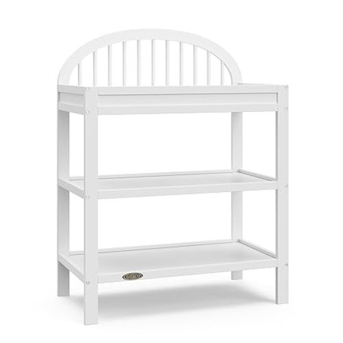 Graco Olivia Changing Table with Water-Resistant Changing Pad (White) - GREENGUARD Gold Certified, Includes Bonus Water-Resistant Changing Pad with Safety Strap, 2 Open Shelves, Stylish Design