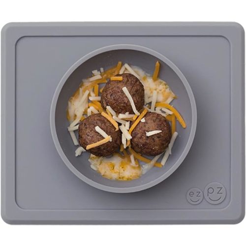 ezpz Mini Bowl for 12 Months+ (Gray) - 100% Silicone Suction Bowl with Built-in Placemat for Toddlers - Comes with a Reusable Travel Bag
