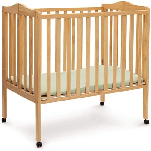 Delta Children Folding Portable Mini Baby Crib with 1.5-inch Mattress - Greenguard Gold Certified, Natural