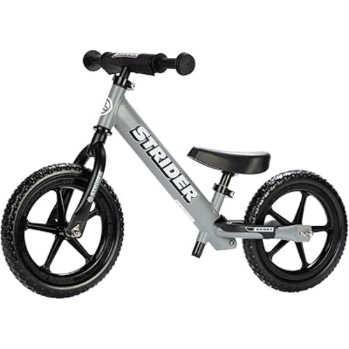 Strider 12” Sport Bike - No Pedal Balance Bicycle for Kids 1 to 4 Years - Includes Safety Pad, Padded Seat, Mini Grips & Flat-Free Tires - Tool-Free Assembly & Adjustments