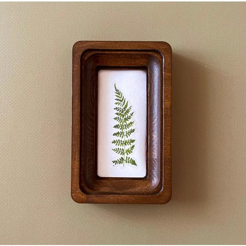 miniature wooden rectangular frame