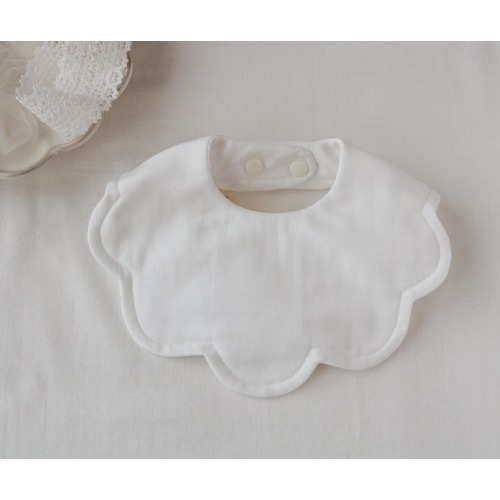 Pastel colour scalloped bib with topstitching