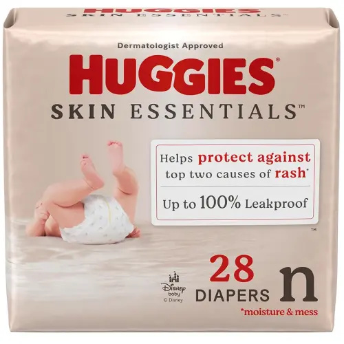 Huggies Size Newborn Diapers, Skin Essentials Baby Diapers, Size Newborn (6-9 lbs), 28 Count, Packaging May Vary