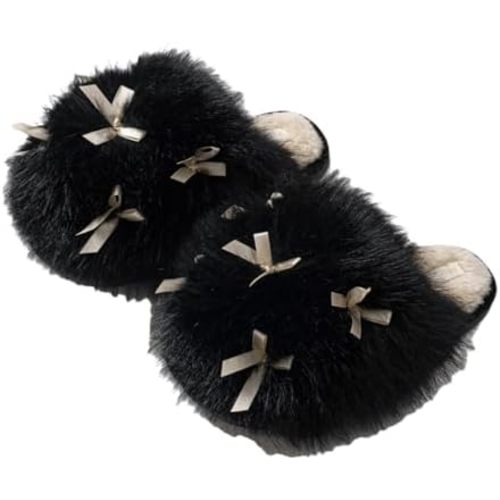 Comfortable bowknot home slippers with non-slip wavy-pattern soles and soft plush insoles. Available in pink, white and black.