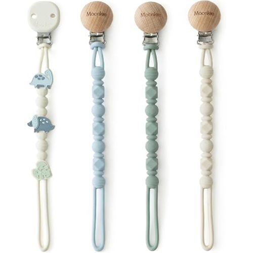Moonkie Silicone Pacifier Clips for Baby – Durable One-Piece Binky Holder, Mixed Styles Paci Clips, Baby Essentials for Newborn Boys & Girls - 4 Pack (Dino Roars)