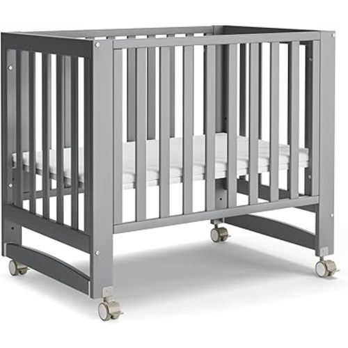 MAMAZING EvoNest Baby Crib, 6 in 1 Convertible Mini Crib with Wheels, 100% New Zealand Wood Growing Bed, 4 Adjustable Mattress Height, GREENGUARD Gold Certified, Grey
