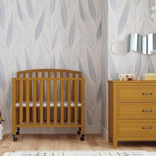 Davinci Dylan Folding Portable 3-in-1 Convertible Mini Crib in Chestnut, Greenguard Gold Certified